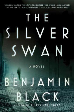 The book cover for The Silver Swan, a blue toned photograph of a street, there is a person out of focus at the end of it.