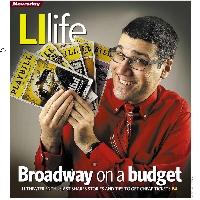 A photo of presenter Brian Stoll holding Broadway Playbills